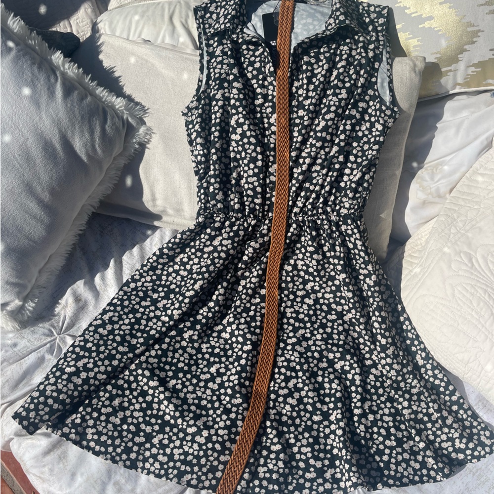 Allegra K. Green dress with white flowers.